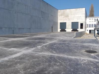 Demapack Oudenaarde, werf, glk, loods, gekalkte grond, buitenverharding, beton, asfalt, laadkade 
