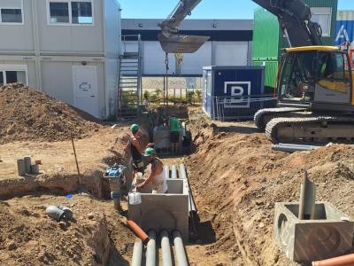 GLK Green-Eagles uit Kruisem plaatsen trekputten en wachtleidingen op werf A Construct te Wevelgem 2026