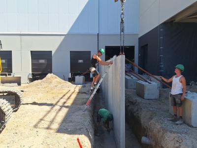 GLK plaatst keermuren op werf van AConstruct in Wevelgem